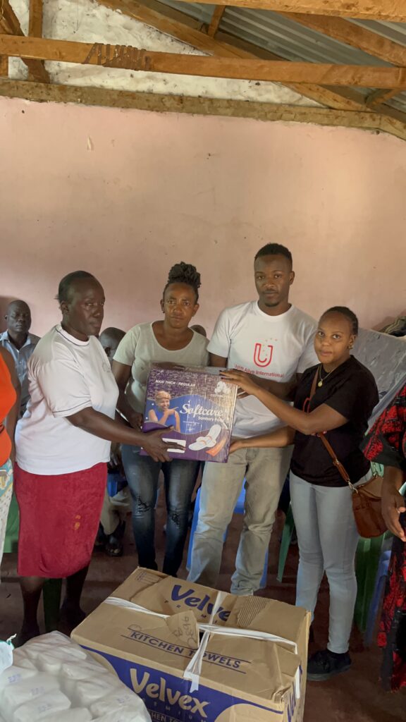 Food Relief and Basic Items by Uplift Alive International Volunteers To Flood Victims At Mathare, Kenya